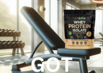 a bag LiveGood Whey Protein Isolate on a weight bench